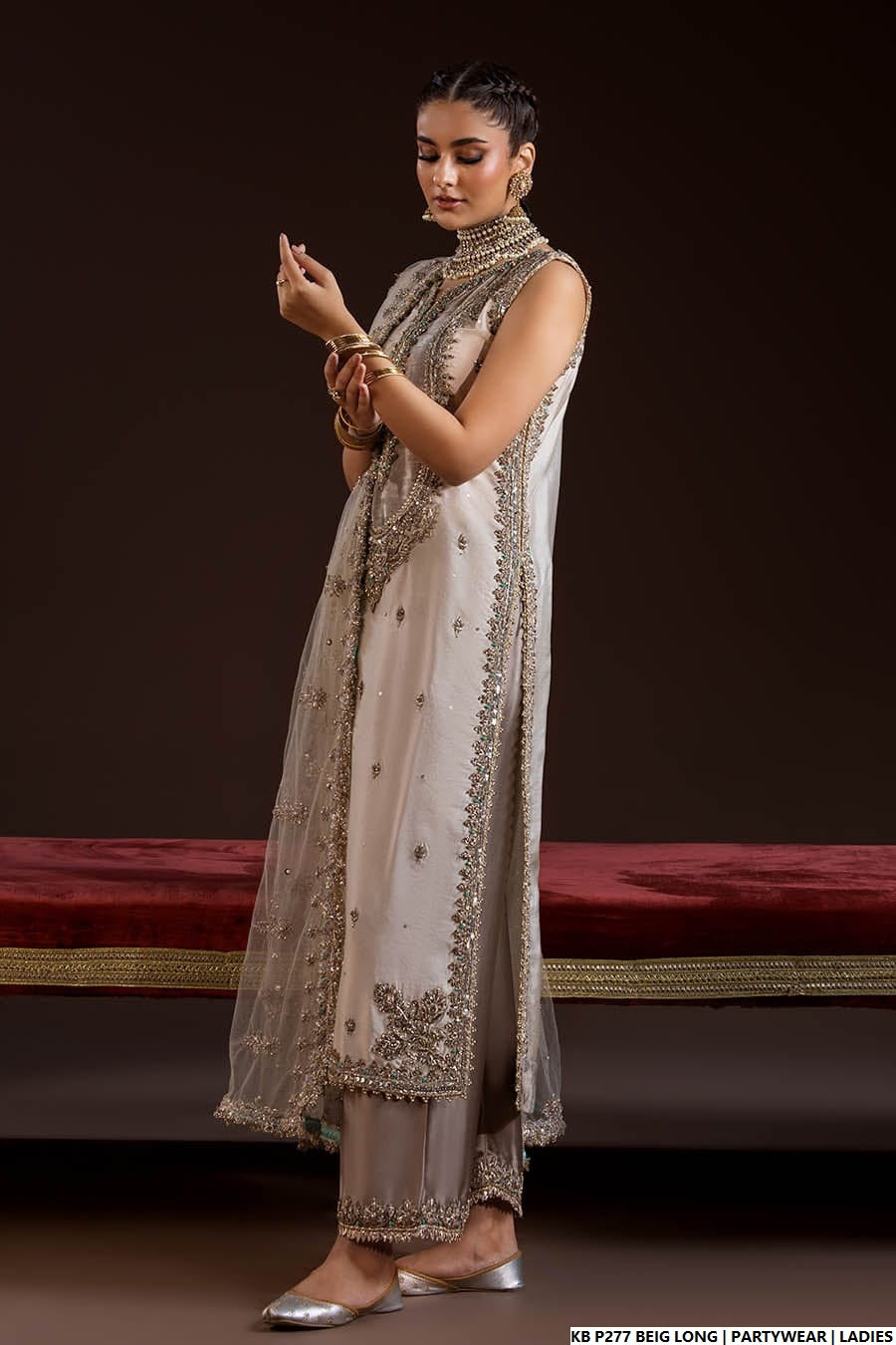 Pakistani women's velvet embroidered long suit detail view