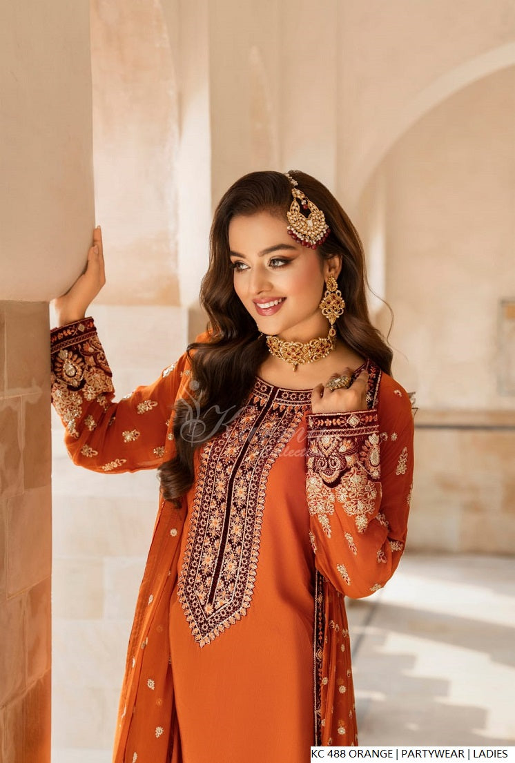Orange silk Pakistani women's long kaftan with plazo side view
