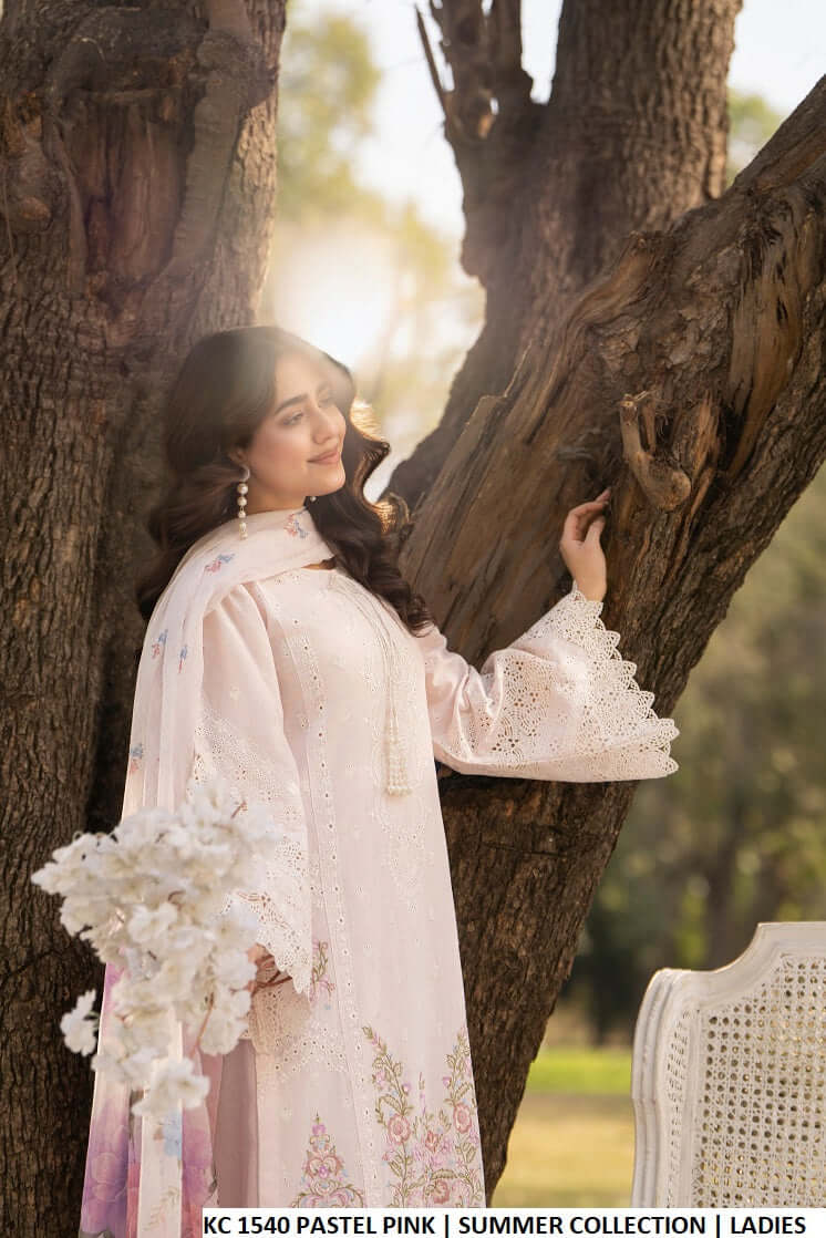Pastel pink cotton Pakistani women's long embroidered shirt side view