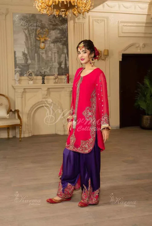 Shocking pink silk Pakistani women's short shirt with farshi shalwar side view