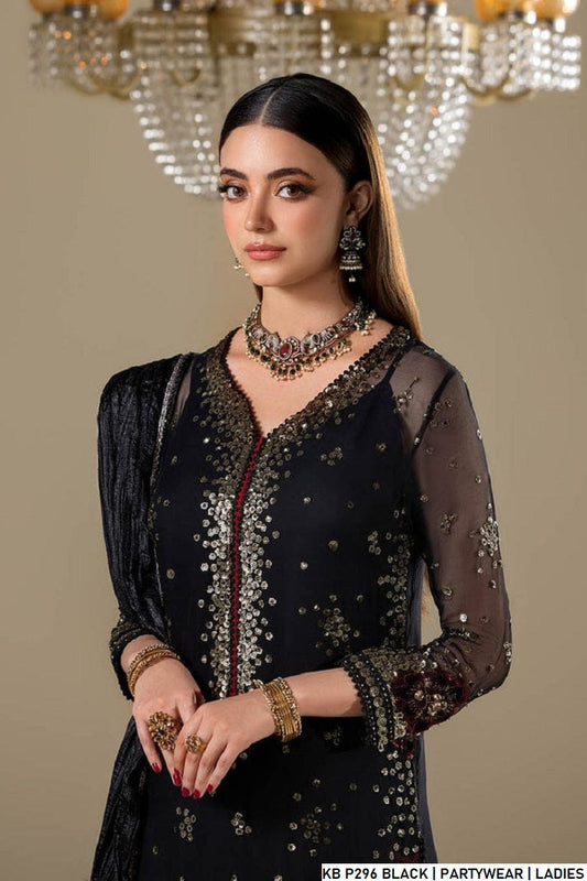 Black velvet Pakistani women's embroidered sharara suit side view