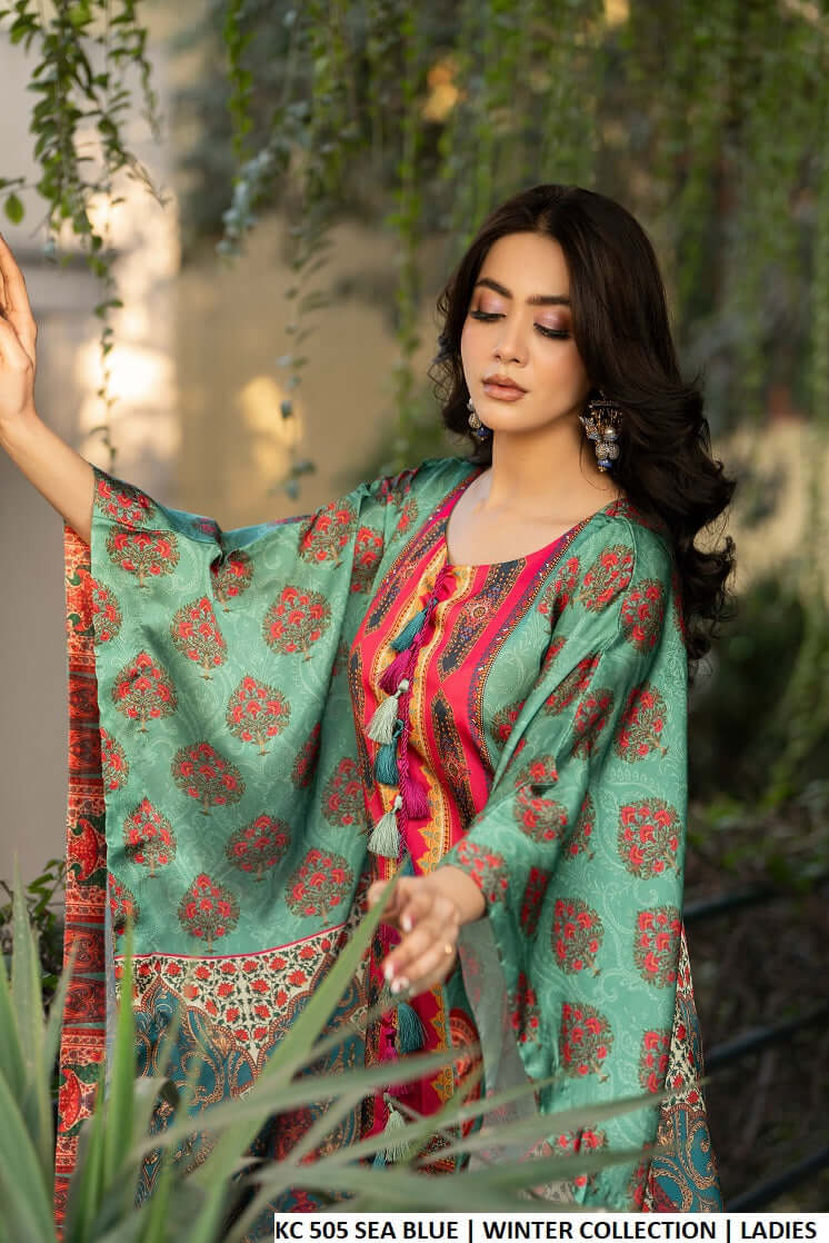 Pakistani women's sea blue silk long kaftan plazo back view