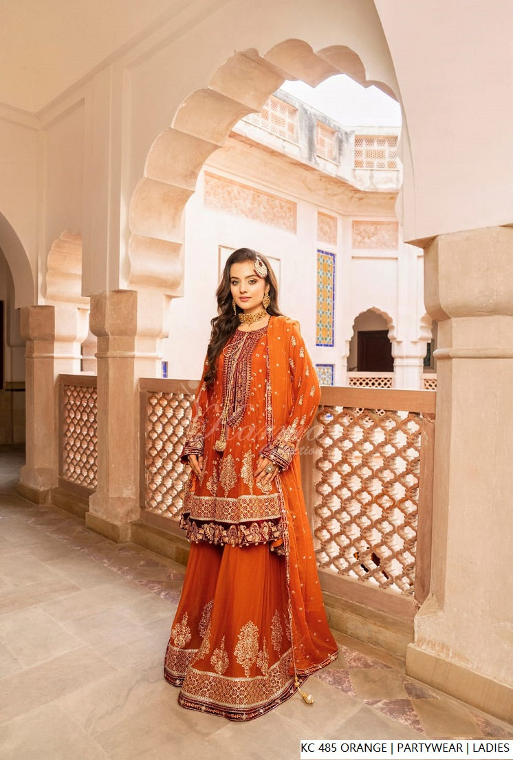 Pakistani women's orange silk long kaftan plazo back view