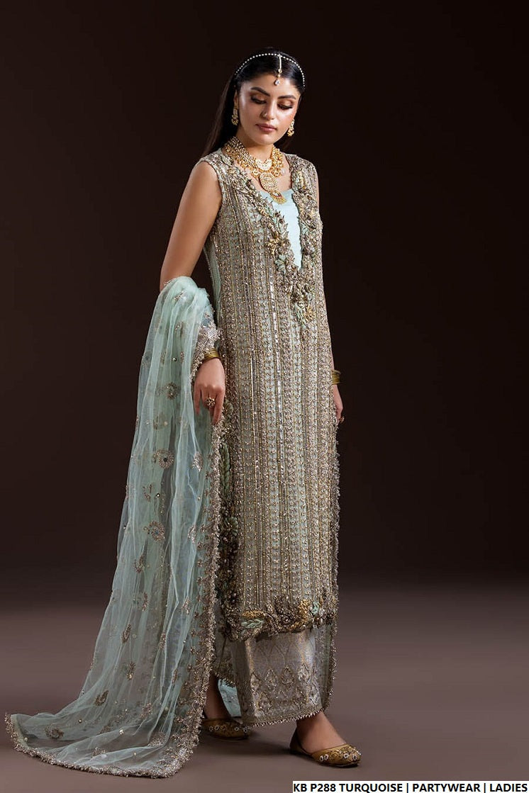 Turquoise hand embroidered Pakistani women's luxury suit side view