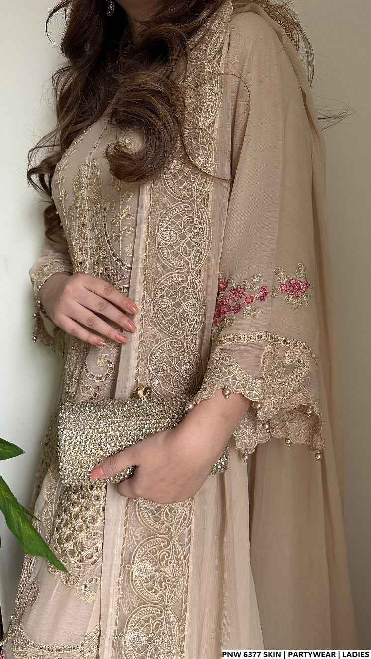 Pakistani women's skin chiffon straight shirt plazo back view