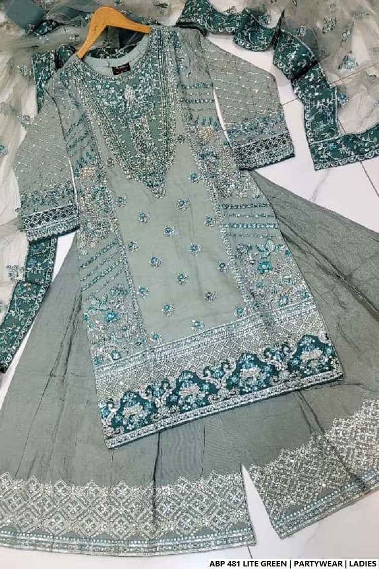 Pakistani women's light green silk short shirt back view
