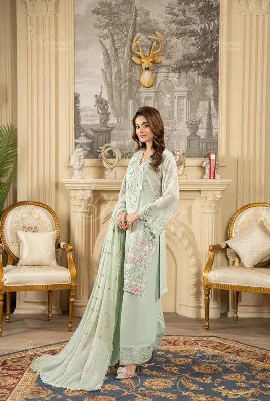 Light green silk Pakistani women's short shirt with farshi shalwar side view
