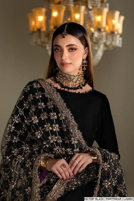Black velvet Pakistani women's embroidered suit side view