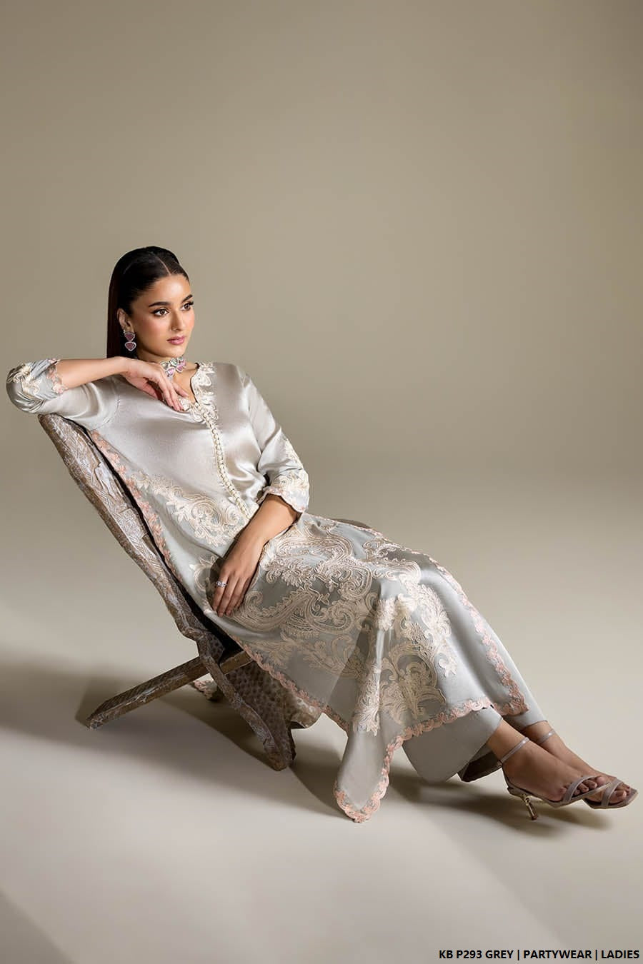 Pakistani women's grey velvet embroidered suit detail view