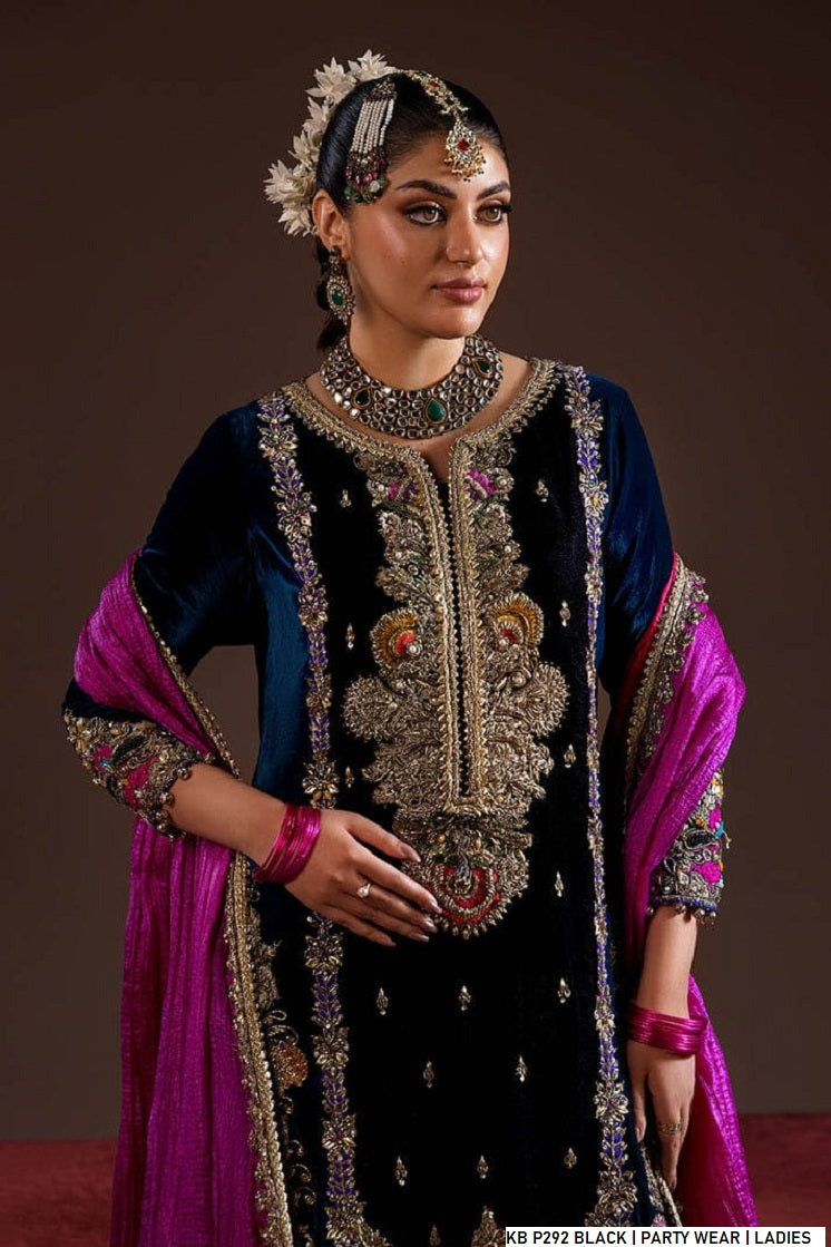 Black velvet Pakistani women's embroidered suit side view
