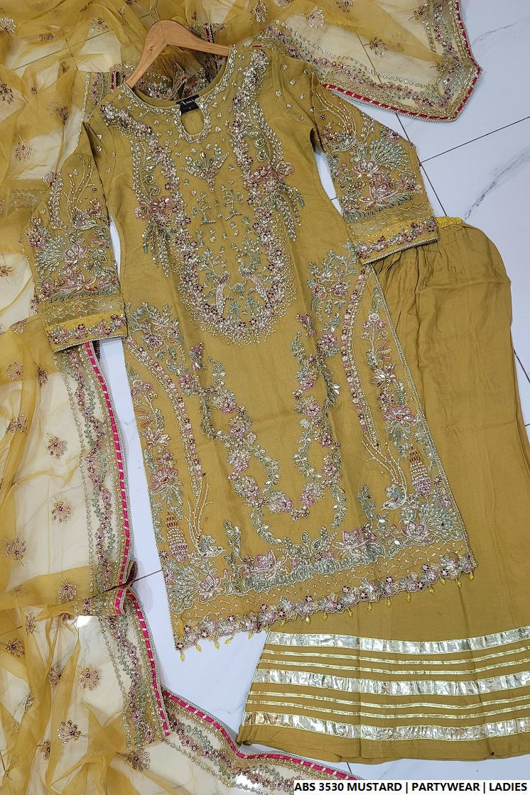 Pakistani women's mustard yellow organza straight shirt back view