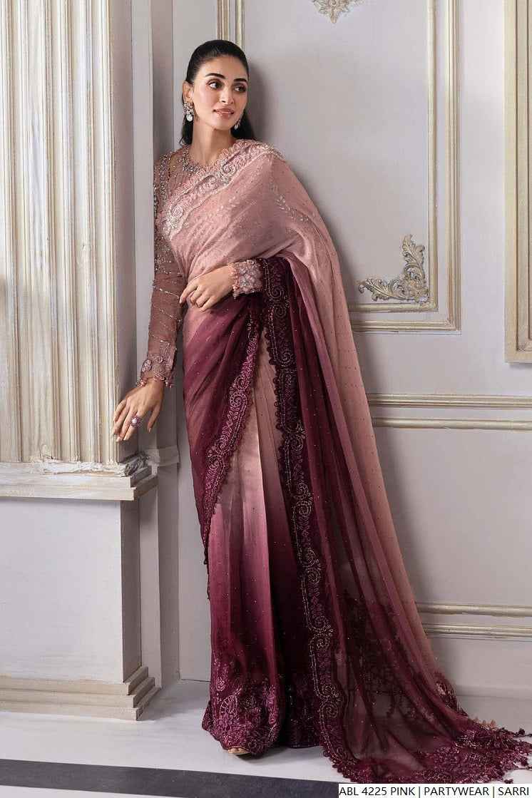 Pakistani women's pink Maria B printed saree back view