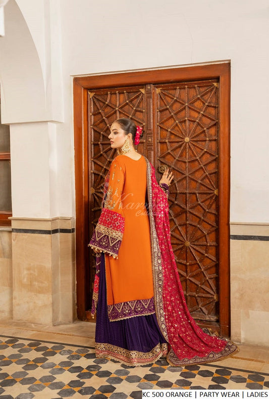 Orange chiffon Pakistani women's long shirt with sharara side view