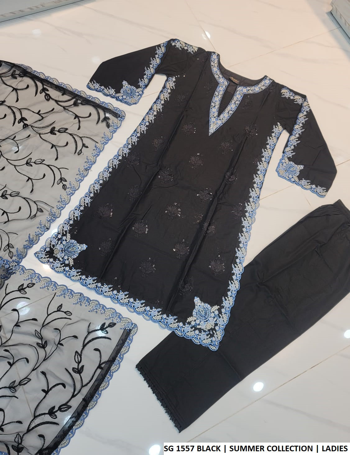 Pakistani women's black lawn A-Line casual outfit back view