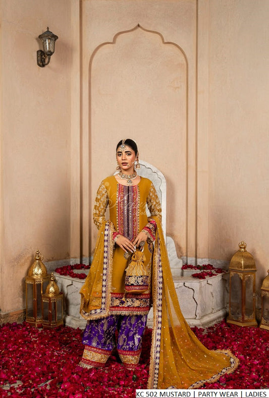 Mustard yellow chiffon Pakistani women's short shirt with shalwar side view