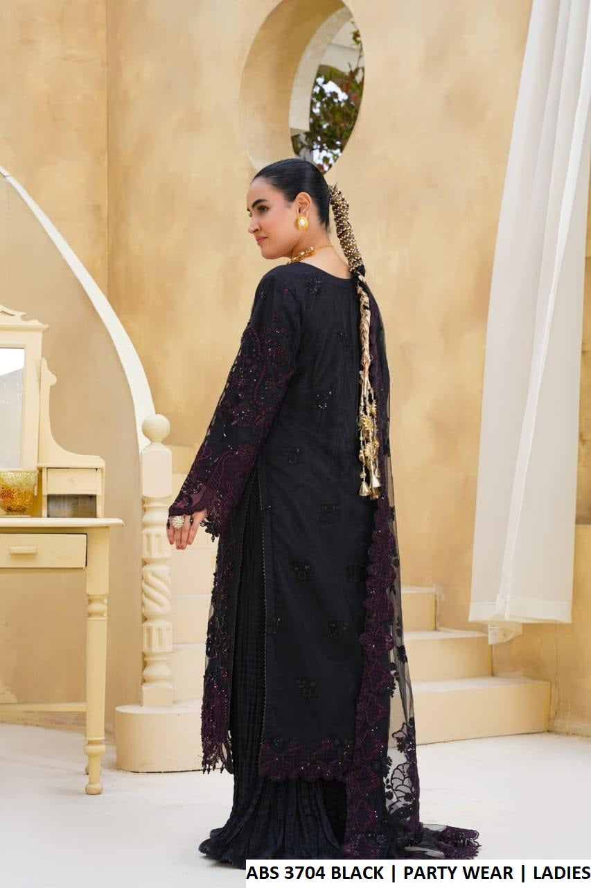 Pakistani women's black soft net outfit detail view
