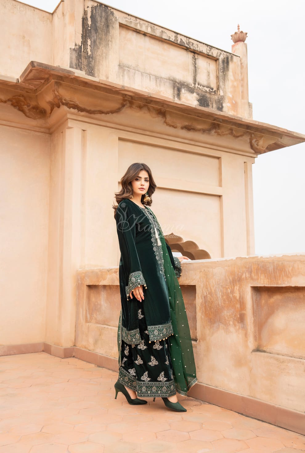 Pakistani women's bottle green velvet long kaftan plazo detail view