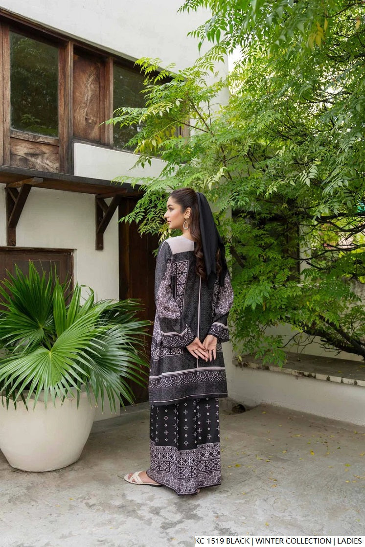 Pakistani women's black silk 2-piece formal suit back view