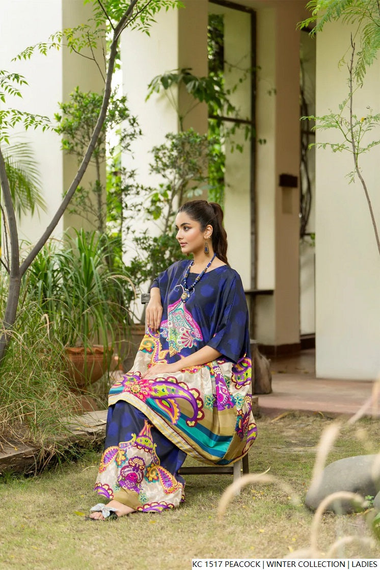 Pakistani women's peacock blue silk 2-piece formal suit back view