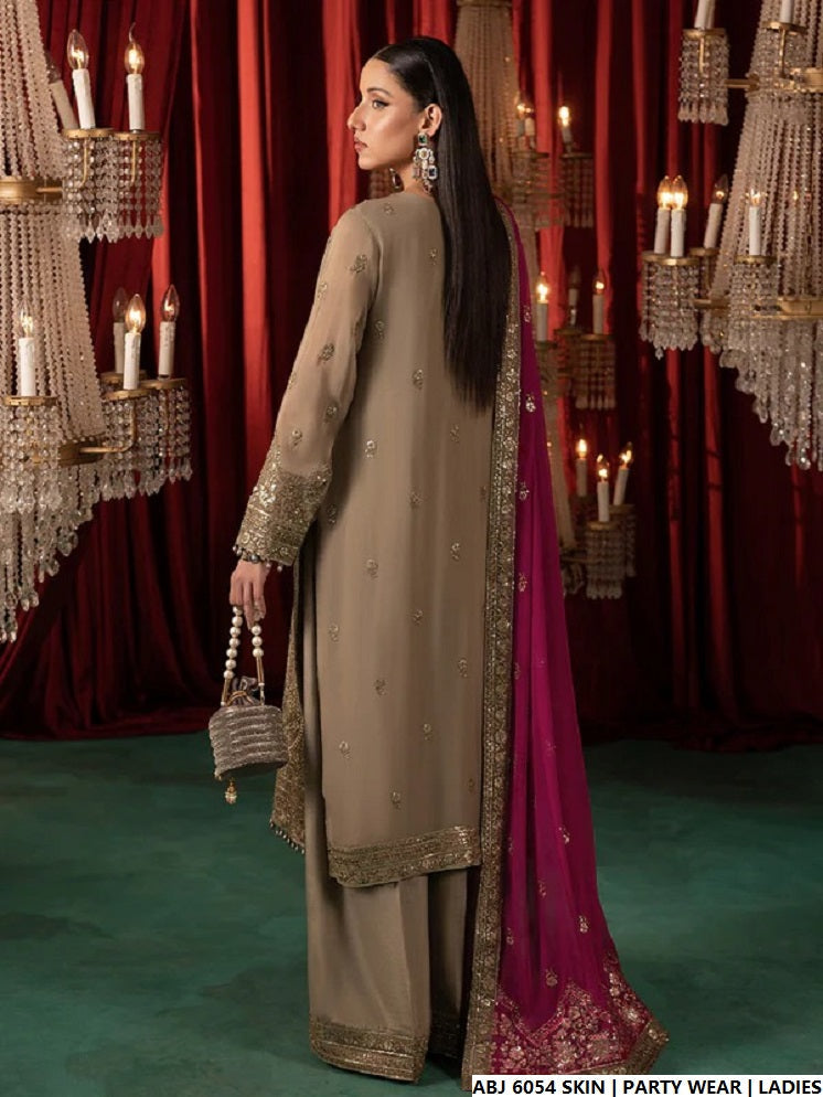 Pakistani women's skin chiffon short frock back view