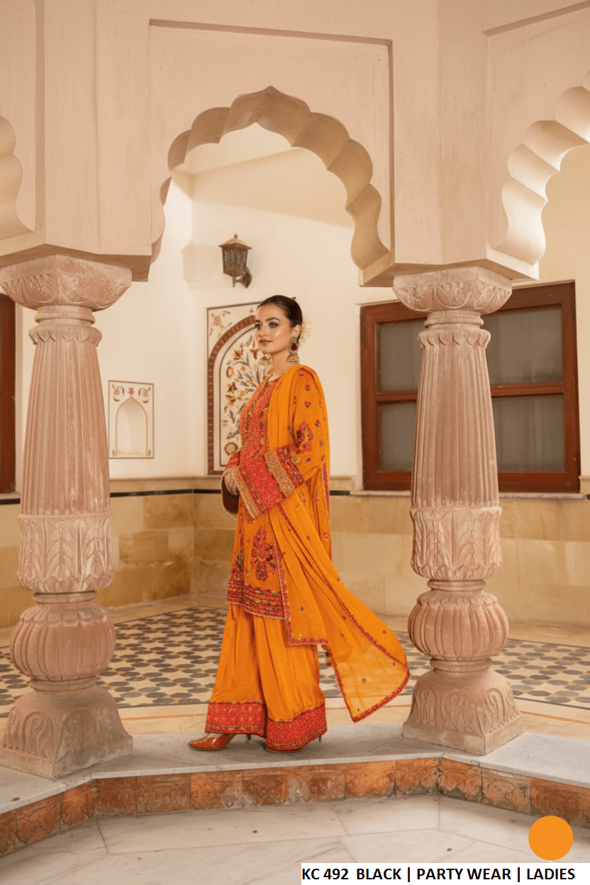 Pakistani women's orange silk long kaftan plazo back view