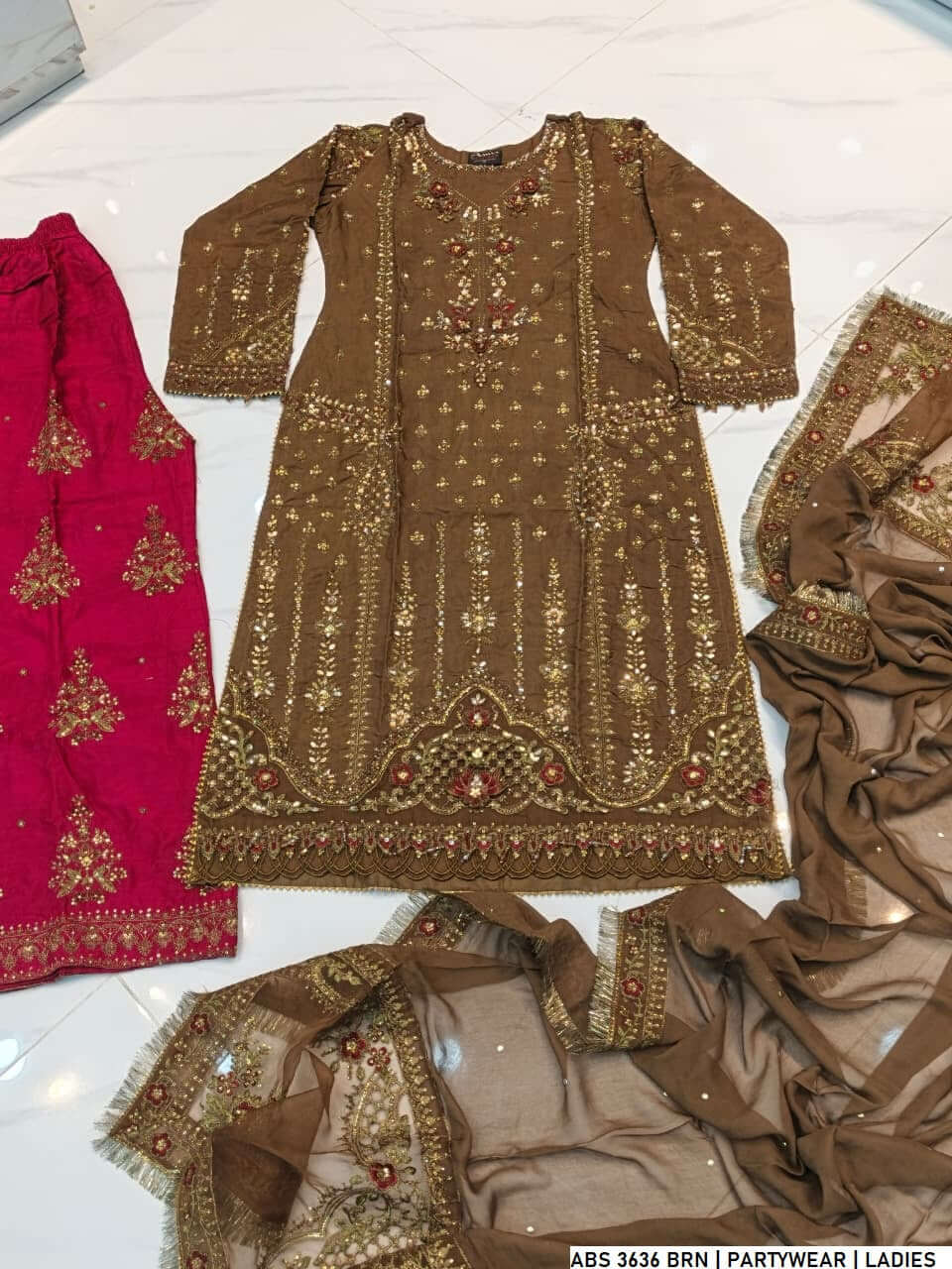 Pakistani women's brown grip straight shirt plazo back view