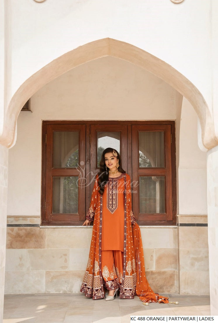 Pakistani women's orange silk long kaftan plazo back view