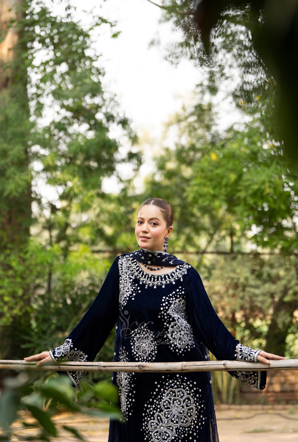 Pakistani women's navy blue velvet long kaftan plazo back view