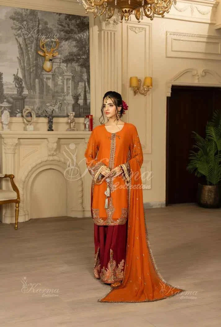 Neon orange silk Pakistani women's short shirt with farshi shalwar side view