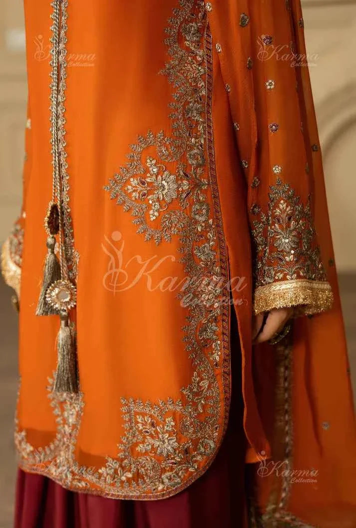 Pakistani women's neon orange silk short shirt farshi shalwar back view