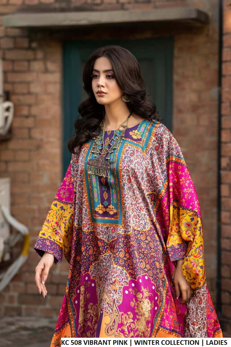 Vibrant pink silk Pakistani women's long kaftan with plazo side view