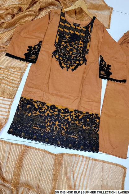 Pakistani women's mustard black lawn A-Line casual outfit back view