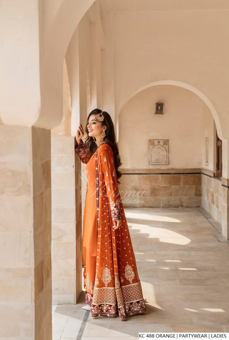 Pakistani women's orange silk long kaftan plazo detail view