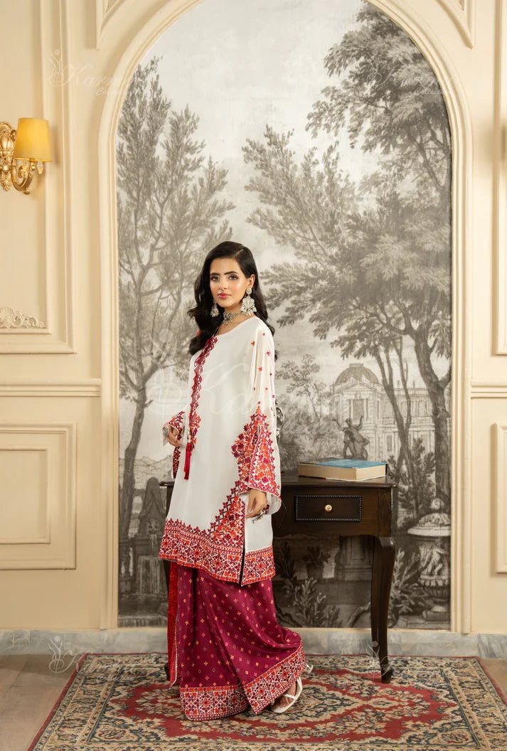 Pink silk Pakistani women's short shirt with farshi shalwar side view