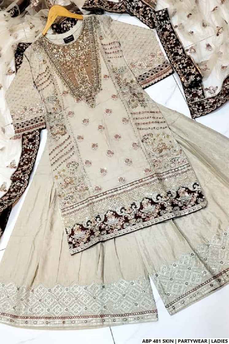 Pakistani women's skin silk short shirt back view