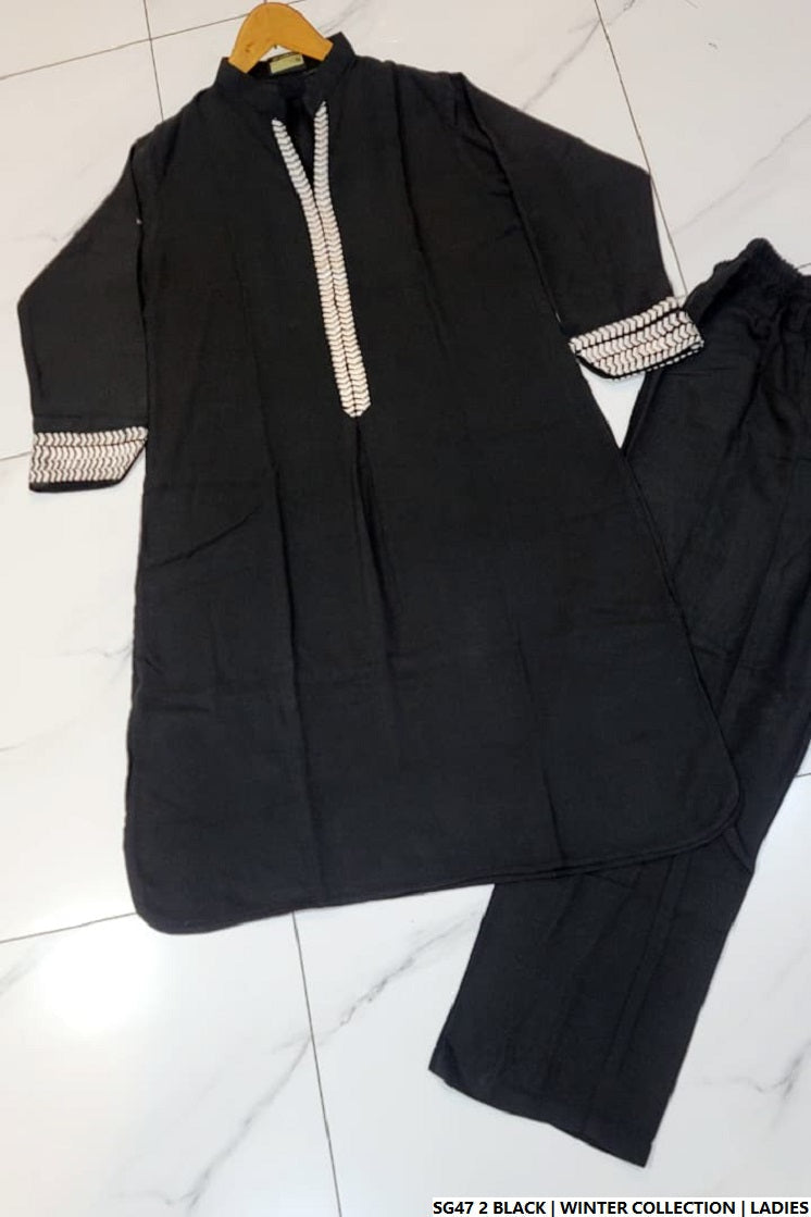 Pakistani women's black lawn A-Line casual outfit back view