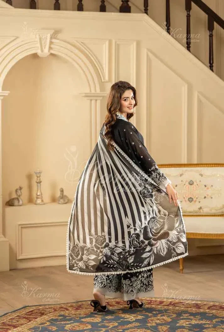 Pakistani women's black silk short shirt farshi shalwar detail view