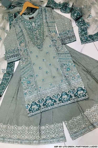 Pakistani women's light green silk short shirt back view