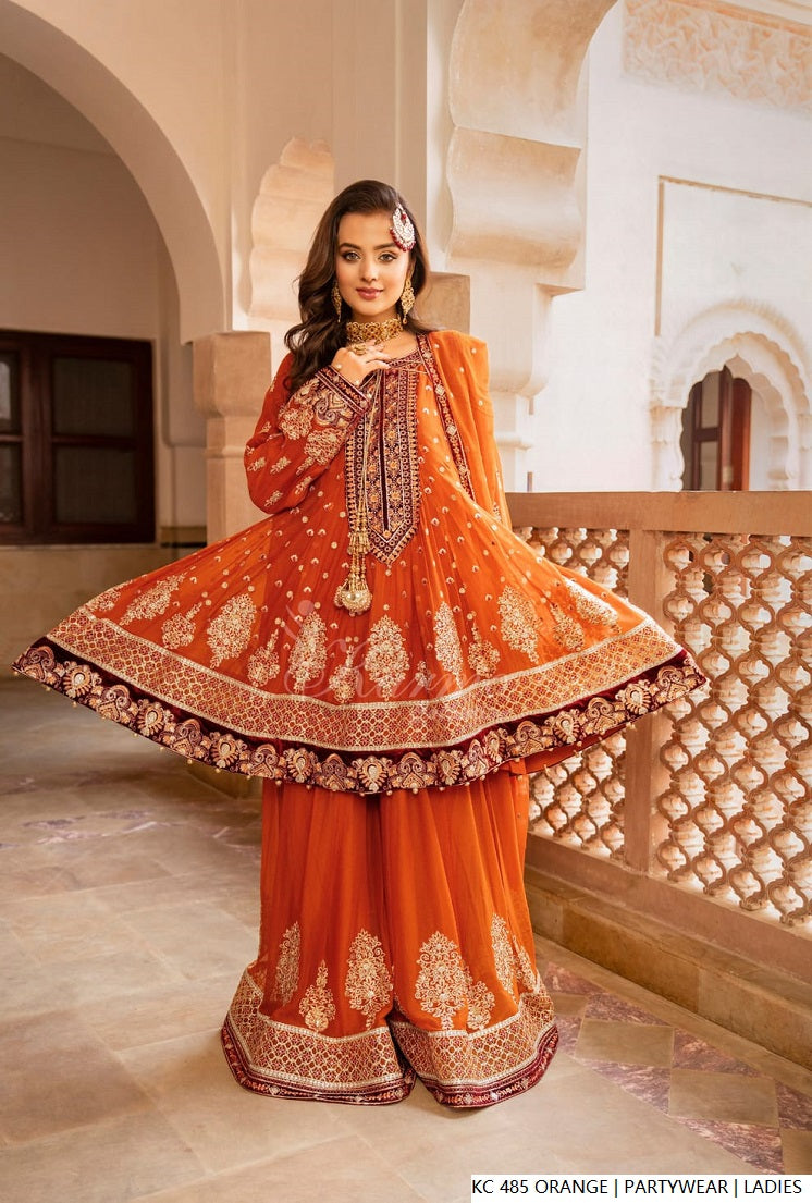 Pakistani women's orange silk long kaftan plazo detail view