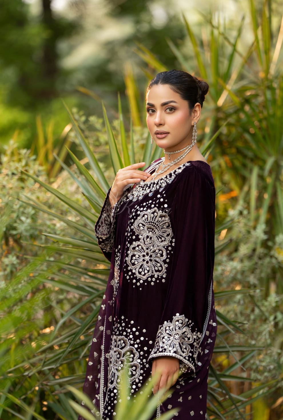 Pakistani women's plum velvet long kaftan plazo back view
