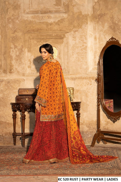 Pakistani women's rust printed georgette sequins embroidered farshi plazo outfit detail view