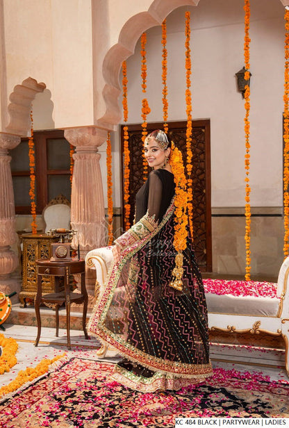 Pakistani women's black silk long kaftan plazo back view