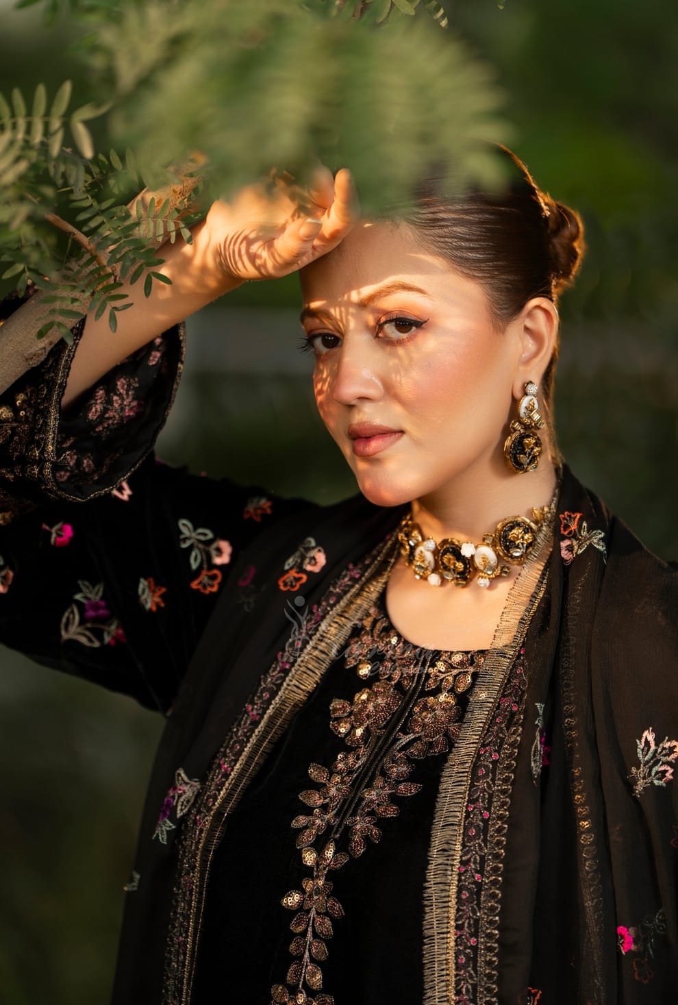 Pakistani women's black velvet long kaftan plazo back view
