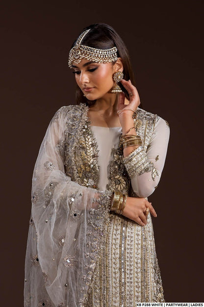 White velvet Pakistani women's embroidered suit side view