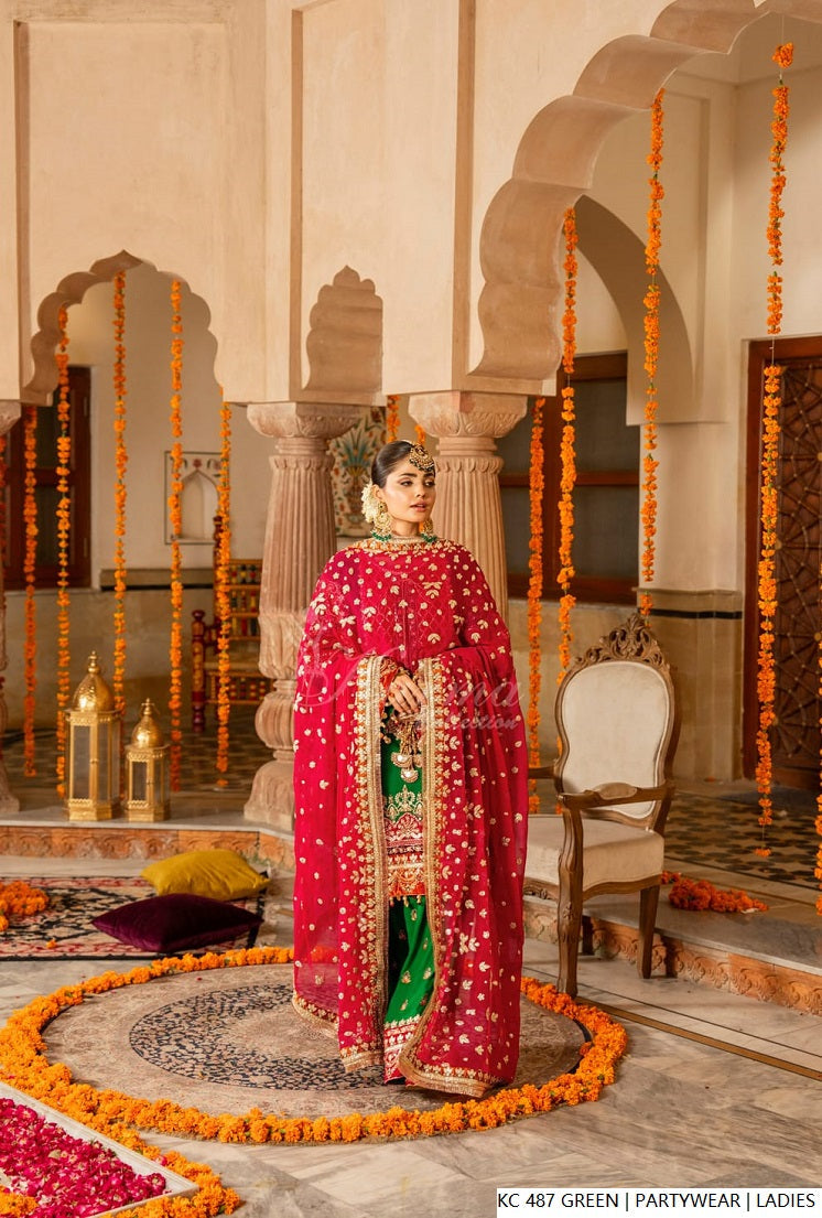 Pakistani women's green silk long kaftan plazo detail view