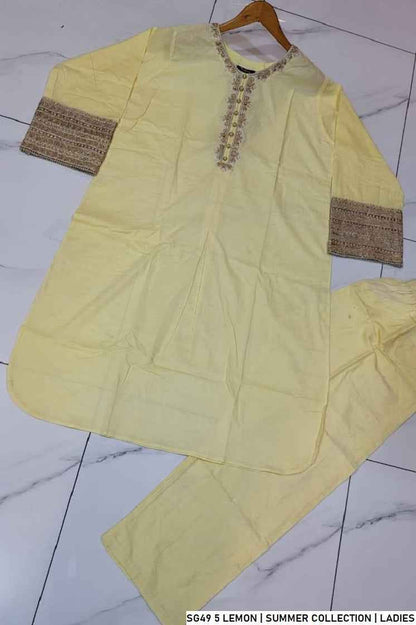 Pakistani women's lemon yellow lawn A-Line casual outfit back view