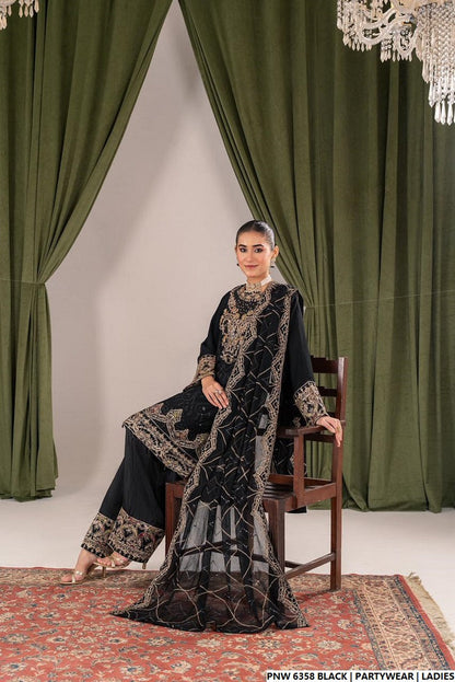 Black chiffon Pakistani women's short shirt with farshi shalwar side view