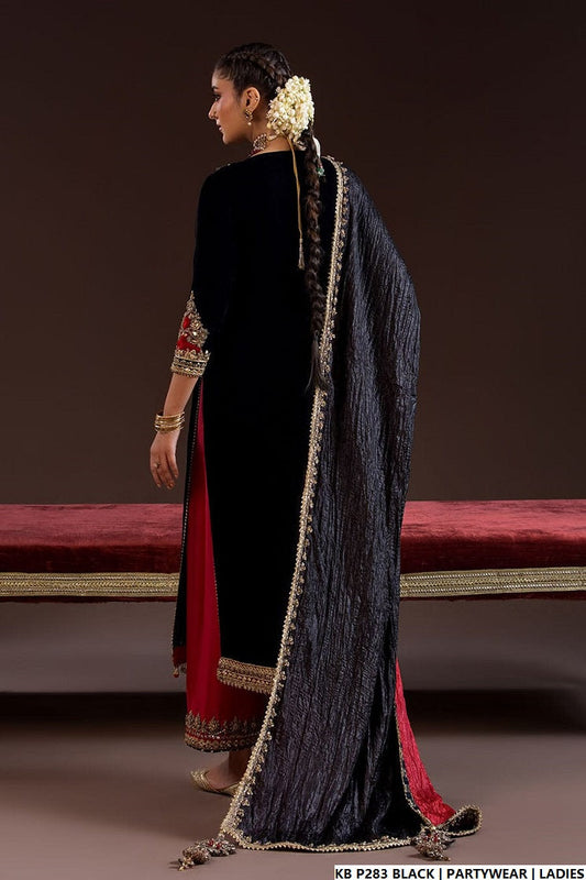 Black velvet hand embroidered Pakistani women's luxury suit side view