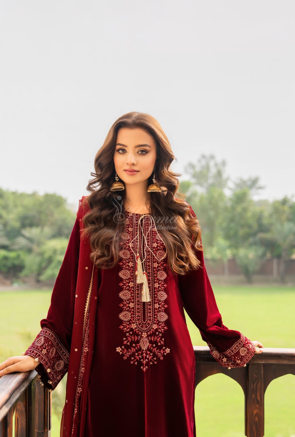 Pakistani women's maroon velvet long kaftan plazo detail view