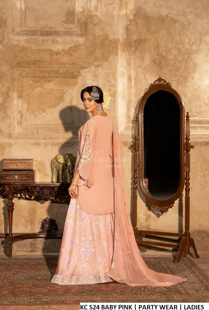 Pakistani women's baby pink georgette short shirt sharara detail view